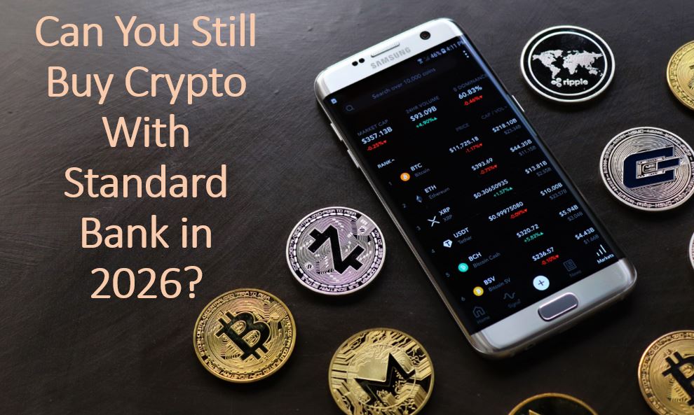 Can You Still Buy Crypto With Standard Bank in 2026 headline displayed beside a smartphone showing cryptocurrency prices surrounded by Bitcoin, XRP, Monero, and other crypto coins.